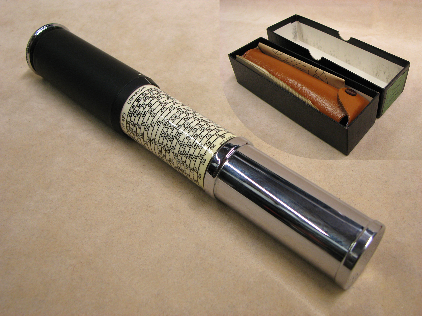 1960's Otis King Model L type C leather cased cylindrical slide rule calculator